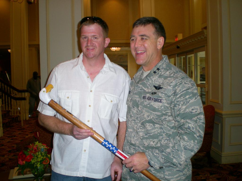 Army CPL Gary Farr presented by Maj Gen Burt Fields. Cane carved Hal Weisel of HVWC.