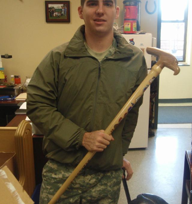 Army SGT Joseph D'Amborsia. Cane carved by Marcus Kruger of MVA&WA.