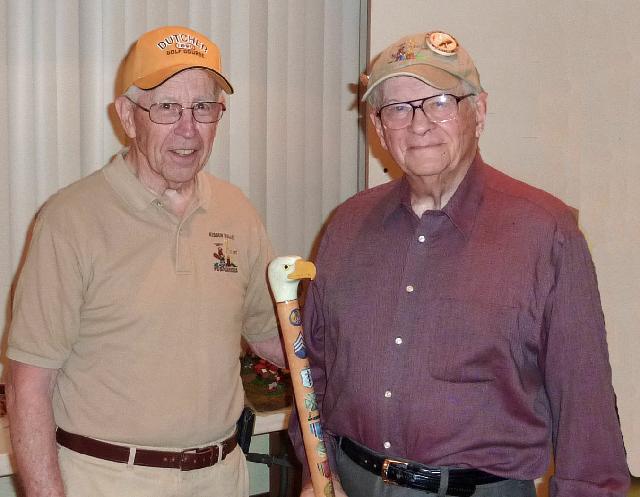 Army Air Force Kenneth G. Stark. Cane carved by Hal Weisel of HVWC.<br>Cane presented by Hal Weisel of HVWC (Left).