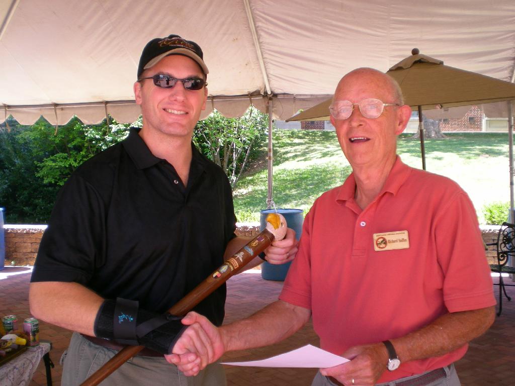 Army MSG Keith Preston presented by COL Sniffen. Cane carved by Ralph Herrmann of HVWC.