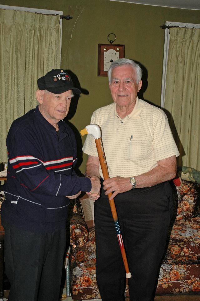 Army Martin M Sten. Presented by Joe Palmeri (Right) of HVWC. Cane carved by Hal Weisel of HVWC.
