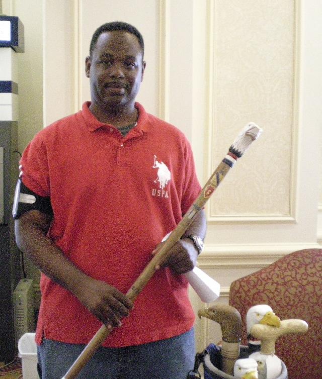 Army SPC Robert Scott III. Cane carved by Bill Ellert of MHWG.