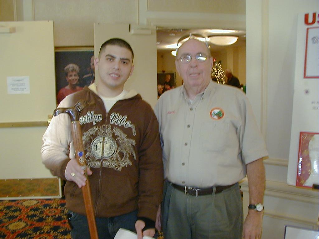 Army SPC Helmer Flores. Cane carved by Hal Weisel of HVWC.