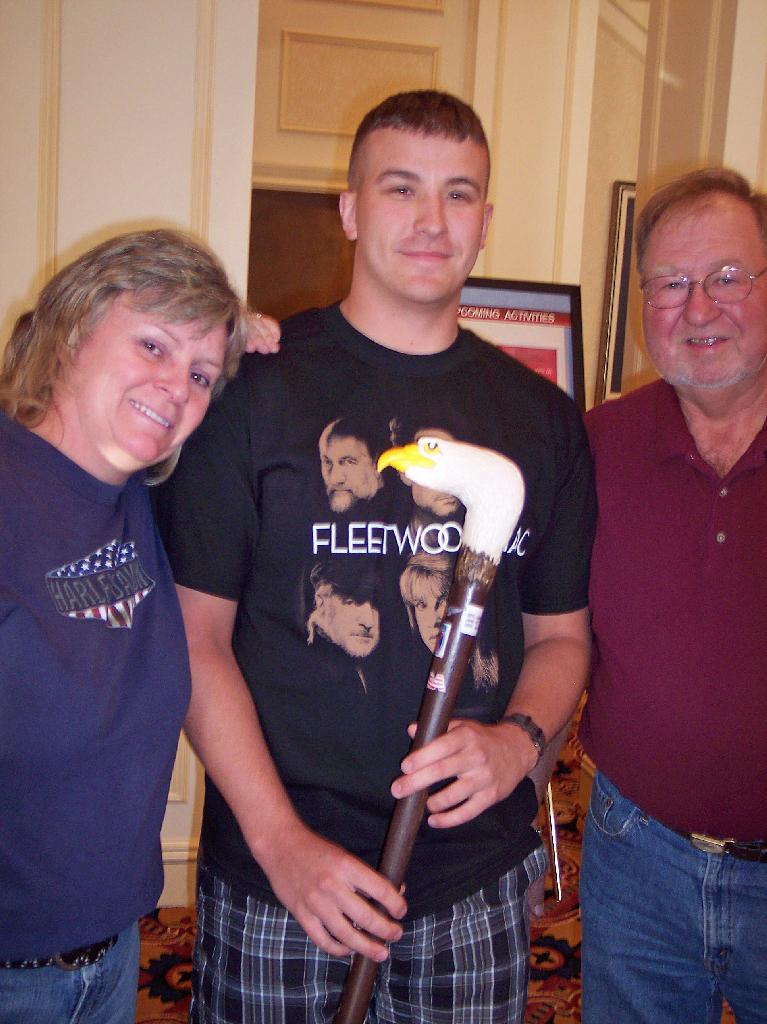 Presentation of cane to Army SPC John Marlett with parents. Carver was Dick Franklin of HVWC.